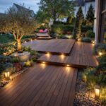 Multi-level dark wood deck with integrated lighting in a landscaped garden at twilight.