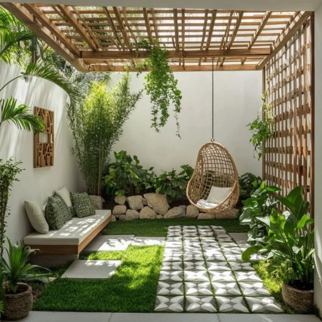 A small courtyard garden with a hanging wicker chair, wooden pergola, and lush green plants.
